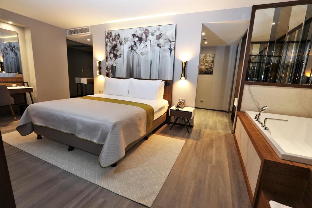 Limak Skopje Luxury Hotel ภายนอก รูปภาพ A bedroom at the hotel